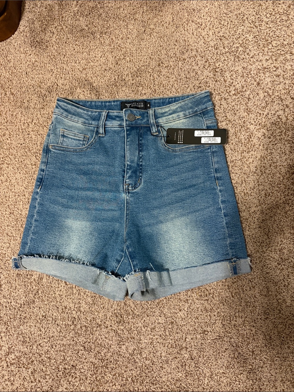 NWT denim shorts size4 inseam with cuff 4”
In cuff is 5.5
